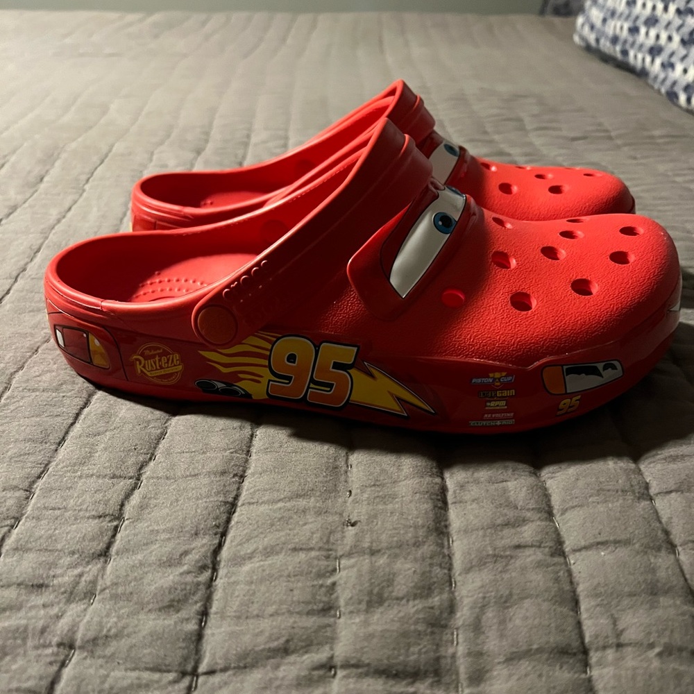 Adult Lightning McQueen Crocs men size 7 women size 9. Brand new with tags.